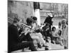 Young Parisian Musicians Enjoying an Impromptu Outdoor Concert on the Banks of the Seine River-Alfred Eisenstaedt-Mounted Photographic Print