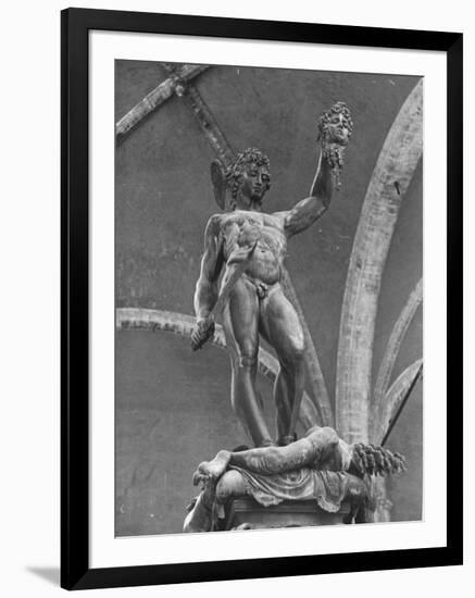 Young Perseus Holding the Decapitated Gorgon Head of Medusa, Standing over Her Body-Carl Mydans-Framed Photographic Print