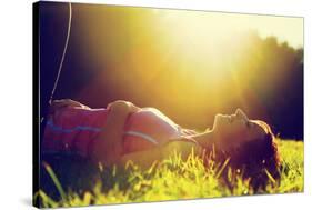 Young Pretty Woman Lying on the Grass at Summer Sunset-Michal Bednarek-Stretched Canvas
