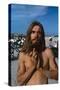 Young Shirtless Man with Long Flowing Hair-Mario de Biasi-Stretched Canvas