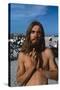 Young Shirtless Man with Long Flowing Hair-Mario de Biasi-Stretched Canvas