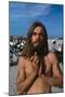 Young Shirtless Man with Long Flowing Hair-Mario de Biasi-Mounted Photographic Print