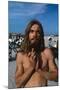 Young Shirtless Man with Long Flowing Hair-Mario de Biasi-Mounted Photographic Print
