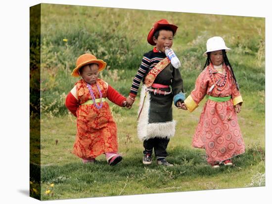 Young Tibetan Children Walk Hand in Hand Near Qinghai Lake-null-Stretched Canvas