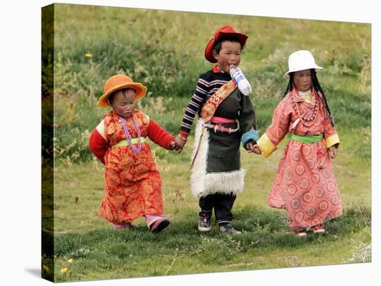 Young Tibetan Children Walk Hand in Hand Near Qinghai Lake-null-Stretched Canvas