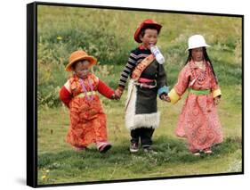 Young Tibetan Children Walk Hand in Hand Near Qinghai Lake-null-Framed Stretched Canvas