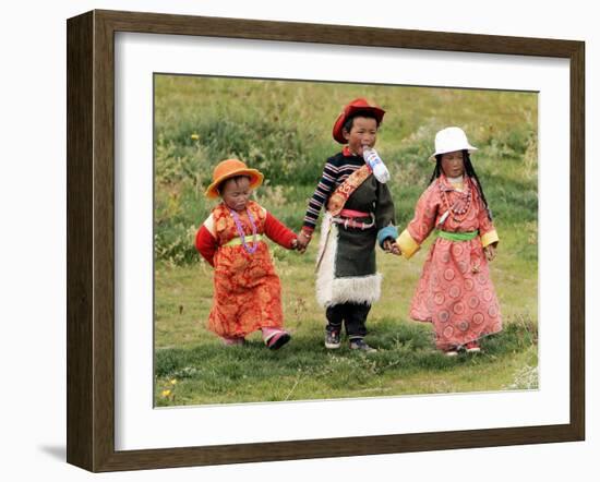 Young Tibetan Children Walk Hand in Hand Near Qinghai Lake-null-Framed Premium Photographic Print