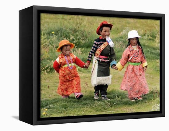 Young Tibetan Children Walk Hand in Hand Near Qinghai Lake-null-Framed Stretched Canvas