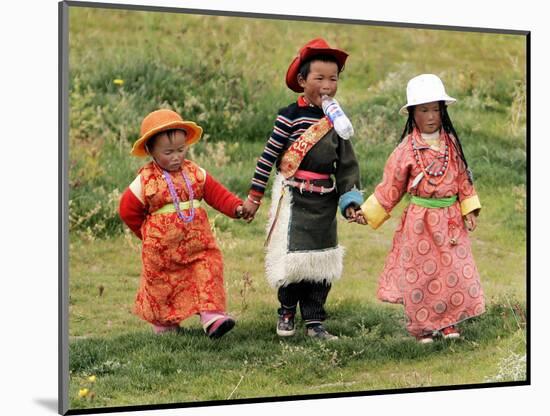 Young Tibetan Children Walk Hand in Hand Near Qinghai Lake-null-Mounted Photographic Print