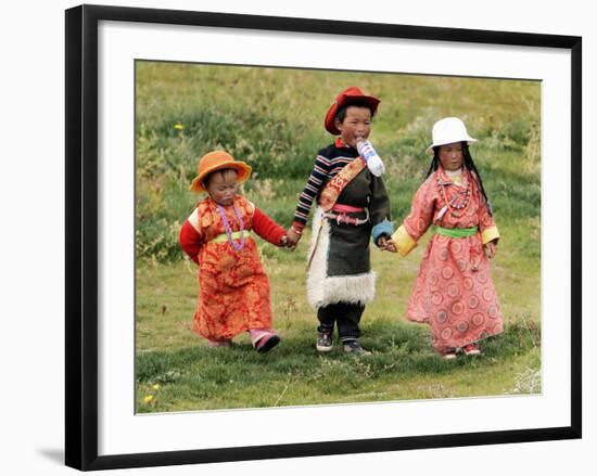 Young Tibetan Children Walk Hand in Hand Near Qinghai Lake-null-Framed Photographic Print