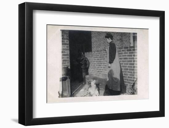 Young Woman and Dog in Back Yard-null-Framed Photographic Print