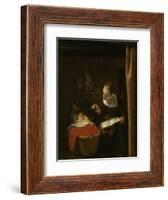 Young Woman at a Cradle, 1652 - 1662-Nicolaes Maes-Framed Art Print