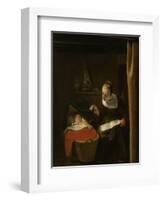 Young Woman at a Cradle, 1652 - 1662-Nicolaes Maes-Framed Art Print