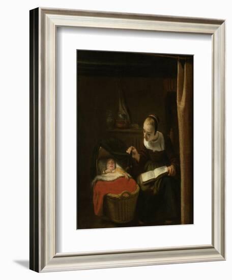 Young Woman at a Cradle, 1652 - 1662-Nicolaes Maes-Framed Art Print