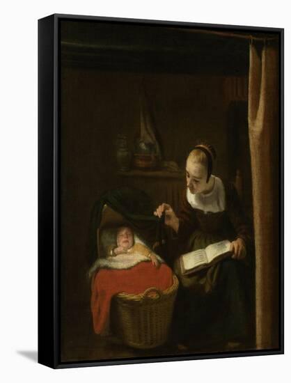 Young Woman at a Cradle, 1652 - 1662-Nicolaes Maes-Framed Stretched Canvas