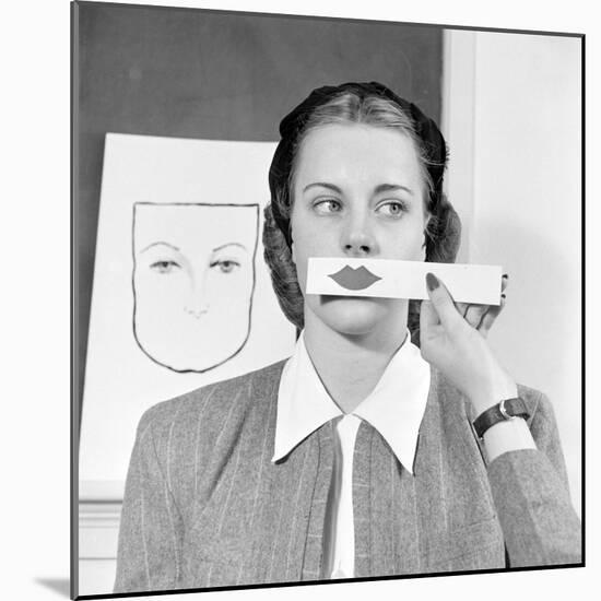 Young Woman at Stephens College Sampling Different Shades of Lipstick, Columbia, Missouri, 1945-Nina Leen-Mounted Photographic Print