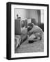 Young Woman Attending to Her Housework by Dusting Off Her Television Set-Nina Leen-Framed Photographic Print