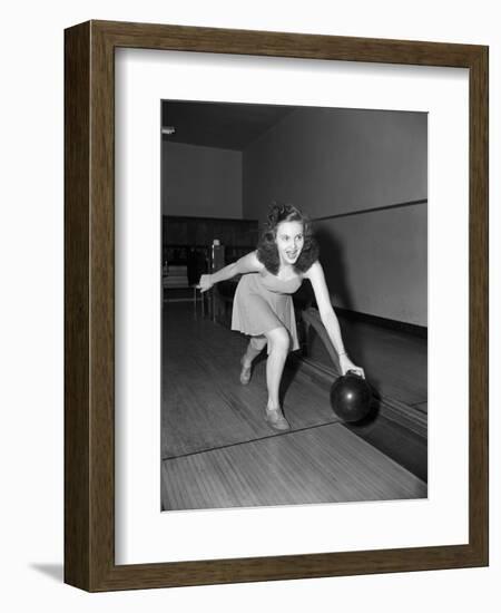 Young Woman Bowling-Philip Gendreau-Framed Photographic Print