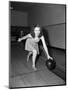 Young Woman Bowling-Philip Gendreau-Mounted Photographic Print