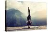 Young Woman Doing Complex Yoga Exercise Headstand with Namaste Asana. Amazing Yoga Landscape in Bea-AnnaTamila-Stretched Canvas
