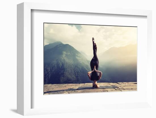 Young Woman Doing Complex Yoga Exercise Headstand with Namaste Asana. Amazing Yoga Landscape in Bea-AnnaTamila-Framed Photographic Print