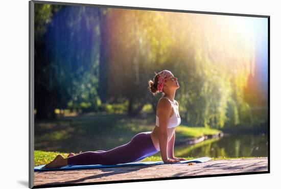 Young Woman Doing Yoga in Morning Park-lkoimages-Mounted Photographic Print