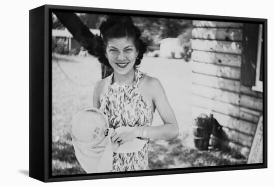 Young Woman Dries a Cooking Pot, Ca. 1939-null-Framed Stretched Canvas