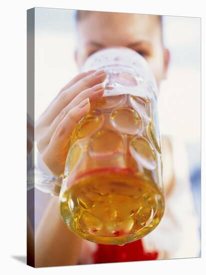 Young Woman Drinking a Litre of Beer at October Fest (Munich)-null-Stretched Canvas