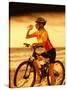 Young Woman Drinking Water Sitting on a Bicycle-null-Stretched Canvas