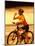 Young Woman Drinking Water Sitting on a Bicycle-null-Mounted Photographic Print