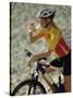 Young Woman Drinking Water While Sitting on a Bicycle-null-Stretched Canvas