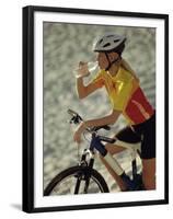 Young Woman Drinking Water While Sitting on a Bicycle-null-Framed Premium Photographic Print