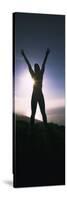 Young Woman Exercising on a Hill-null-Stretched Canvas