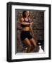 Young Woman Exercising on a Stationary Bike Checking her Heart Rate-null-Framed Photographic Print