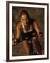 Young Woman Exercising on a Stationary Bike-null-Framed Photographic Print