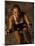 Young Woman Exercising on a Stationary Bike-null-Mounted Photographic Print