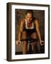 Young Woman Exercising on a Stationary Bike-null-Framed Photographic Print