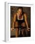 Young Woman Exercising on a Stationary Bike-null-Framed Photographic Print