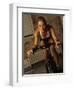 Young Woman Exercising on a Stationary Bike-null-Framed Photographic Print