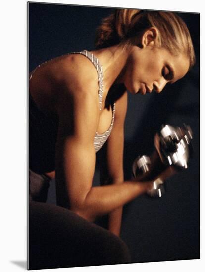 Young Woman Exercising with Dumbbells-null-Mounted Photographic Print