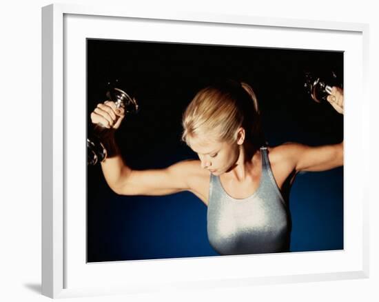 Young Woman Exercising with Dumbbells-null-Framed Photographic Print