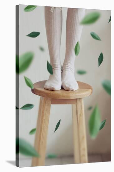 Young Woman Feet in Socks on a Stool-Carolina Hernandez-Stretched Canvas