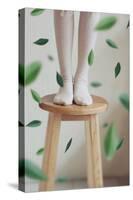 Young Woman Feet in Socks on a Stool-Carolina Hernandez-Stretched Canvas