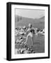 Young Woman Hiking Through a Stream of Water-null-Framed Photo