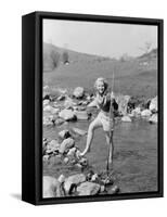 Young Woman Hiking Through a Stream of Water-null-Framed Stretched Canvas