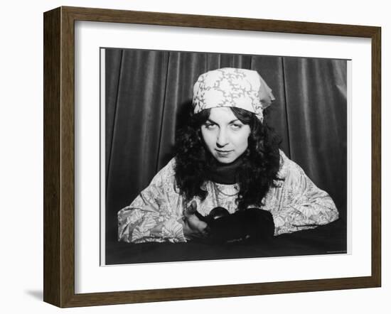 Young Woman Holding a Crystal Ball-null-Framed Photographic Print