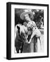 Young Woman in a Cowboy Hat Holding a Goat While Leaning Against Her Pony-null-Framed Photo