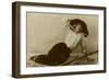 Young Woman in a Large Hat Sitting on Straw-null-Framed Photographic Print