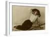 Young Woman in a Large Hat Sitting on Straw-null-Framed Photographic Print