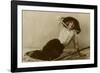 Young Woman in a Large Hat Sitting on Straw-null-Framed Photographic Print